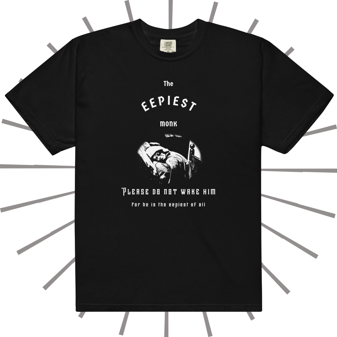 Front side of a black T-shirt with medieval-inspired white text reading "The Eepiest Monk" at the top. Below that is a rendering of the sleeping monk animatronic from the Spaceship Earth ride at Epcot in Disney World, all in white. Below that is more medieval-inspired text reading "Please do not wake him for he is the eepiest of all." 