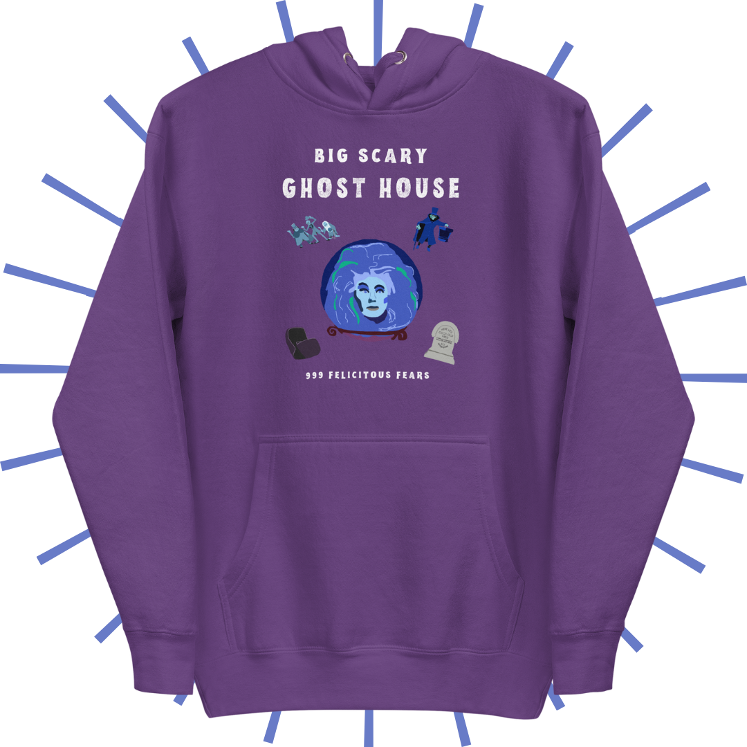 Front side of a purple hoodie with spooky white text reading "Big Scary Ghost Host". Below that are 5 shakily rendered drawings, MS Paint style. In the center is Madame Leota in her crystal ball. In the upper left corner are the hitchhiking ghosts. To their right is the hatbox ghost. On the bottom left is an empty doom buggy. On the bottom right is a gravestone reading, “Here lies dear old Fred... a great big rock fell on his head.”