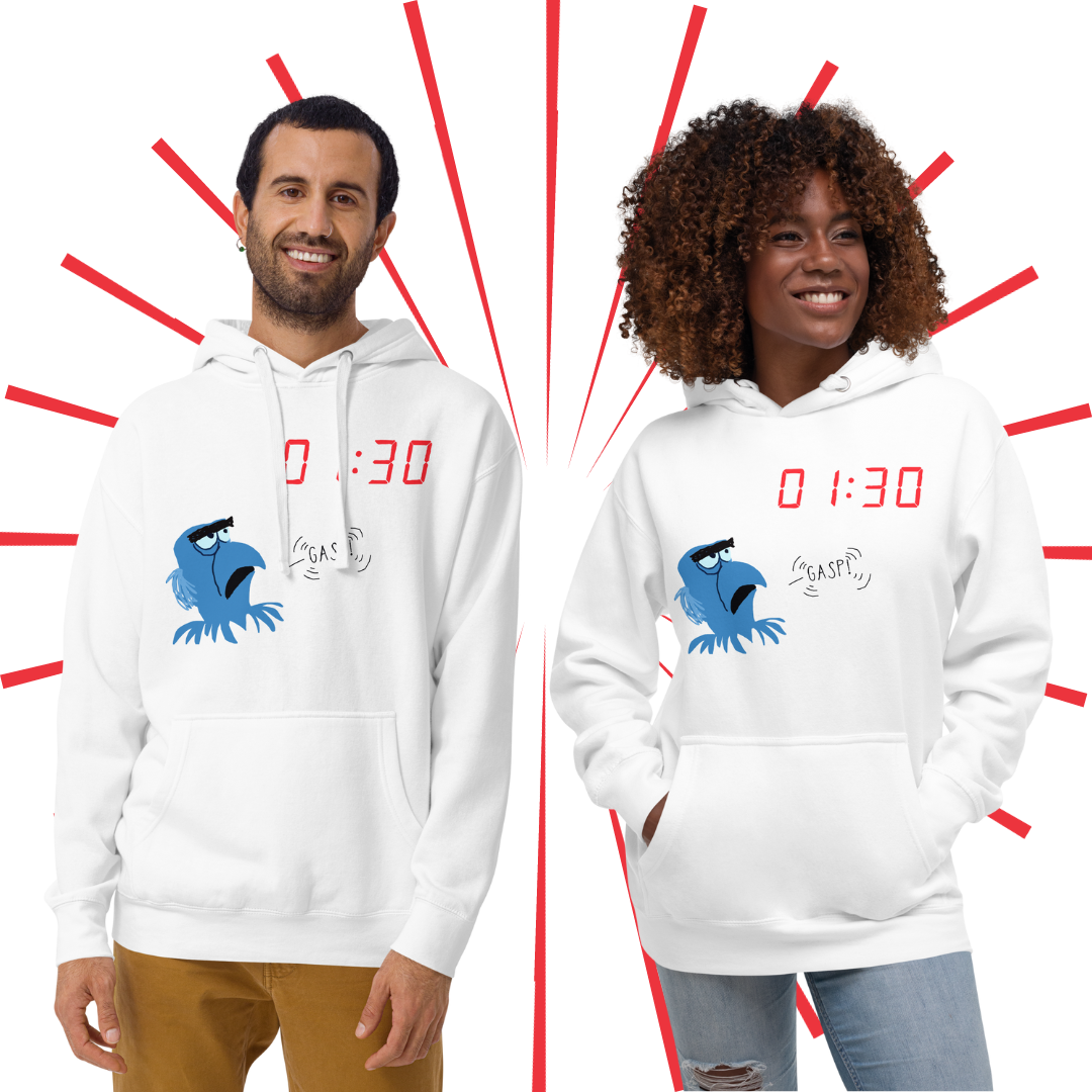 A young, dark-haired Caucasian male and Black female with brown, curly hair stand side-by-side. They are both wearing the GASP! hoodie in white and smiling.