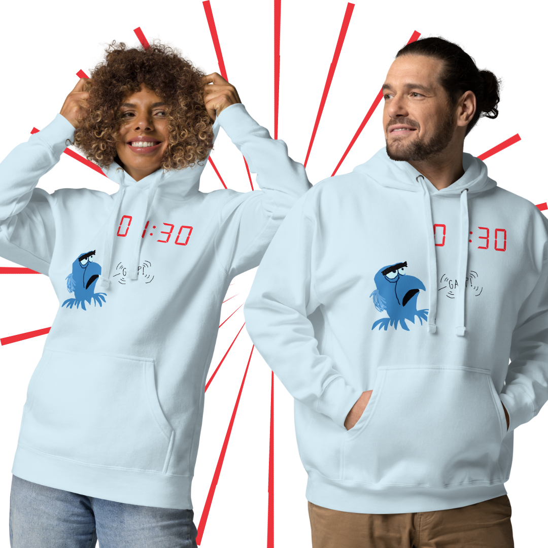 A young, black female with curly, light brown hair wearing the GASP! hoodie in light blue. She playfully pulls up the hood as she stands next to a Caucasian male with light brown hair, beard, and long hair pulled back into a bun. He also dons the GASP! hoodie in light blue.