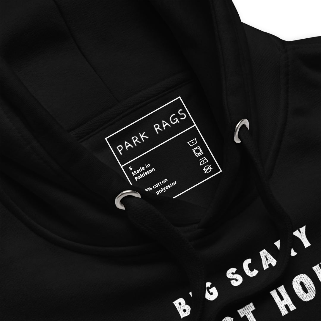  A detail shot of the black hoodie's inner label. It is white with the Park Rags logo, along with the size, information about the garment's material, and care instruction symbols.